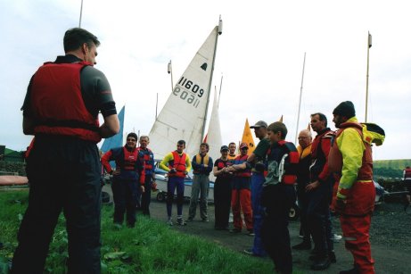 Members listening to a pre-race briefing